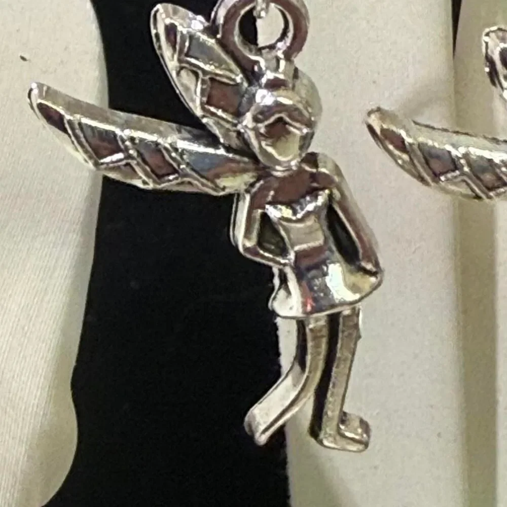 Source Unknown silver tone